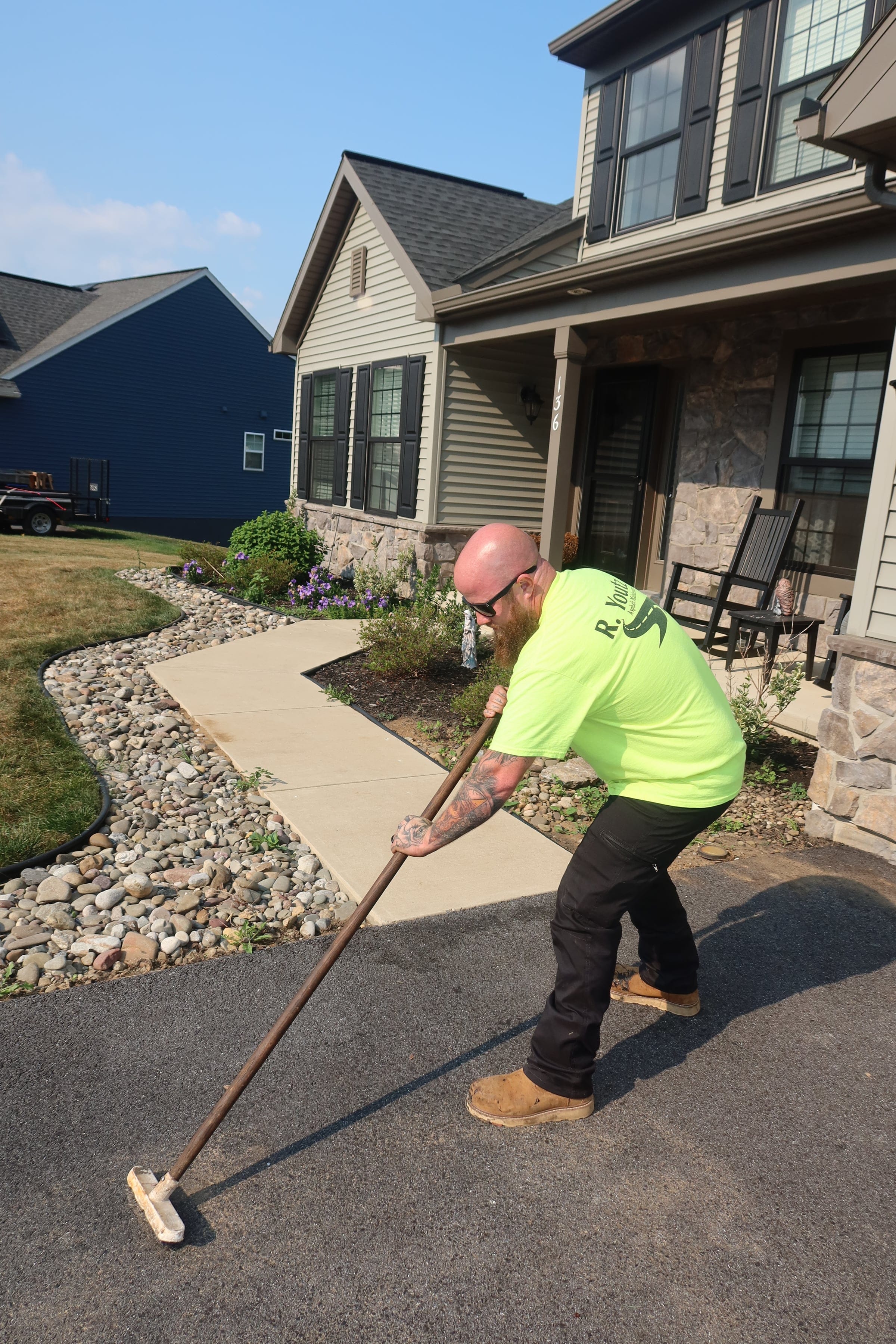 Brush sealant application — R. Youtz Asphalt Maintenance