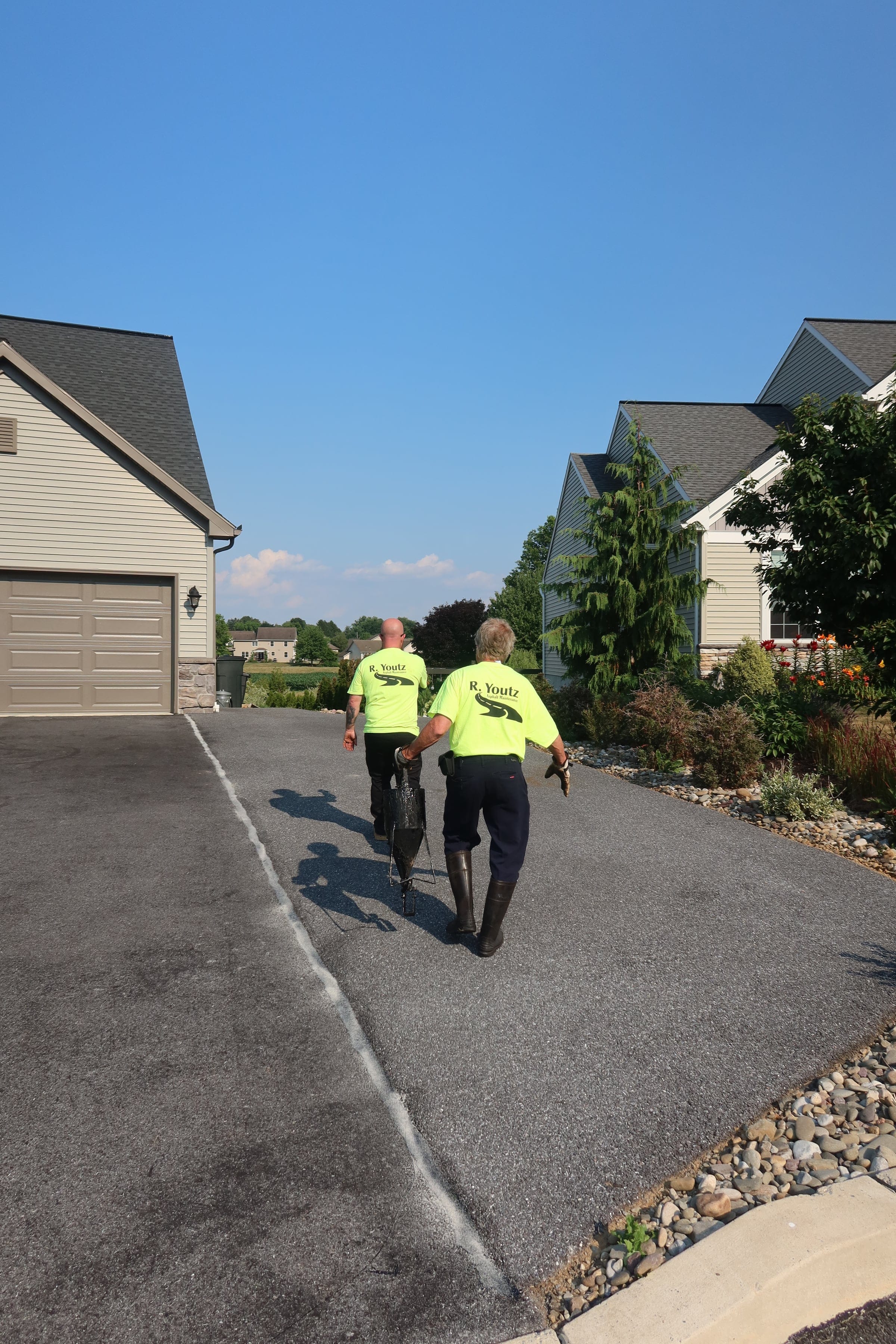 Crew on crack repair job — R. Youtz Asphalt Maintenance