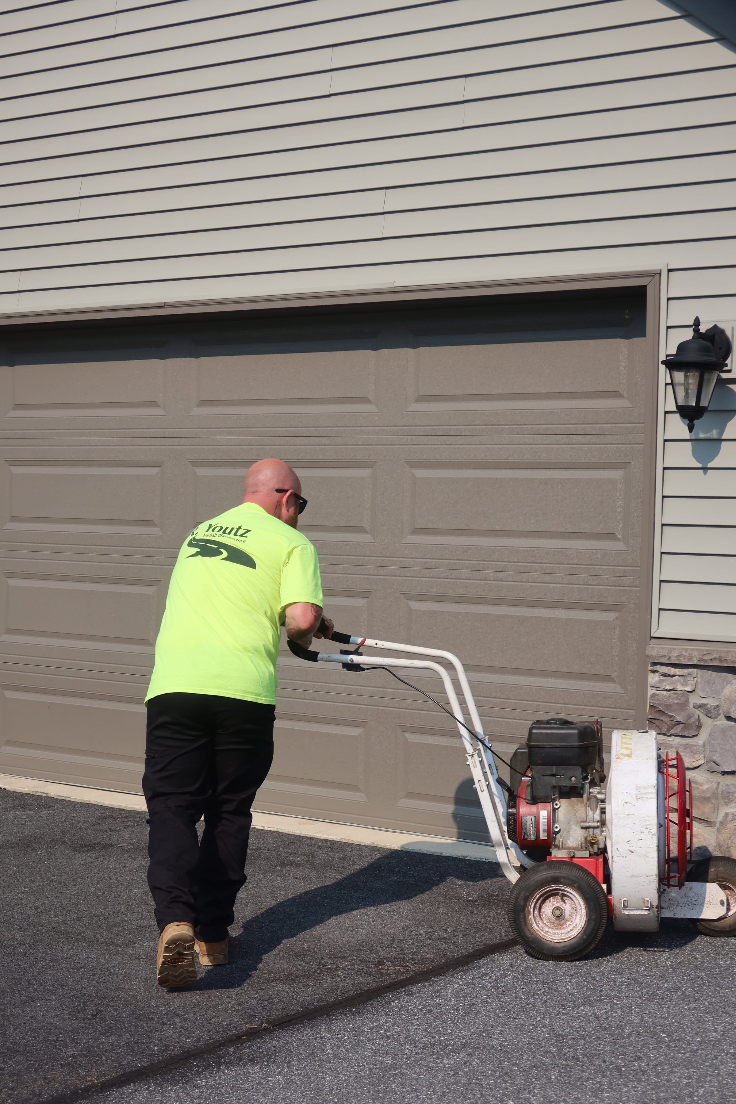Blower prep before sealcoating — R. Youtz Asphalt Maintenance