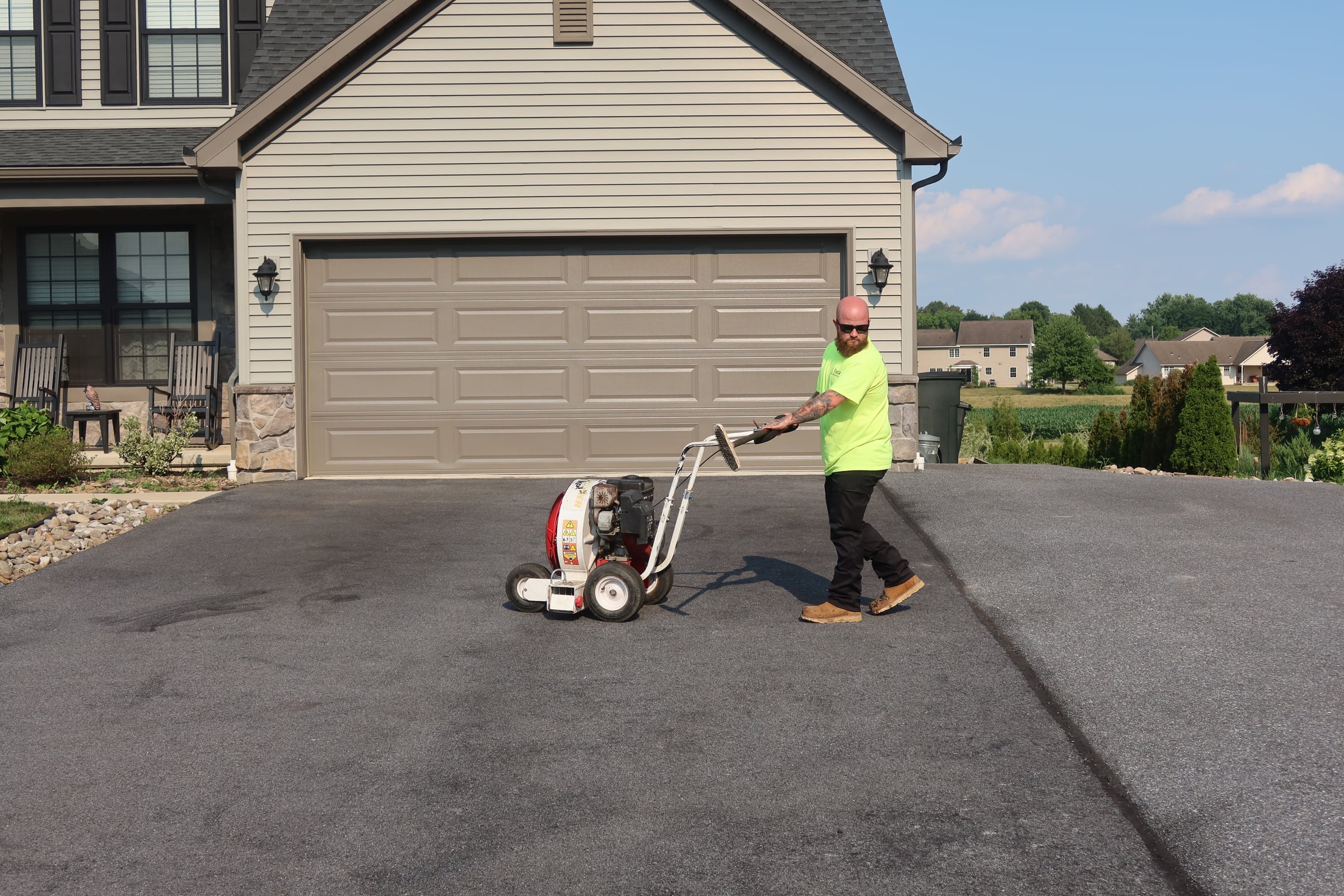 Driveway blower prep before sealcoating