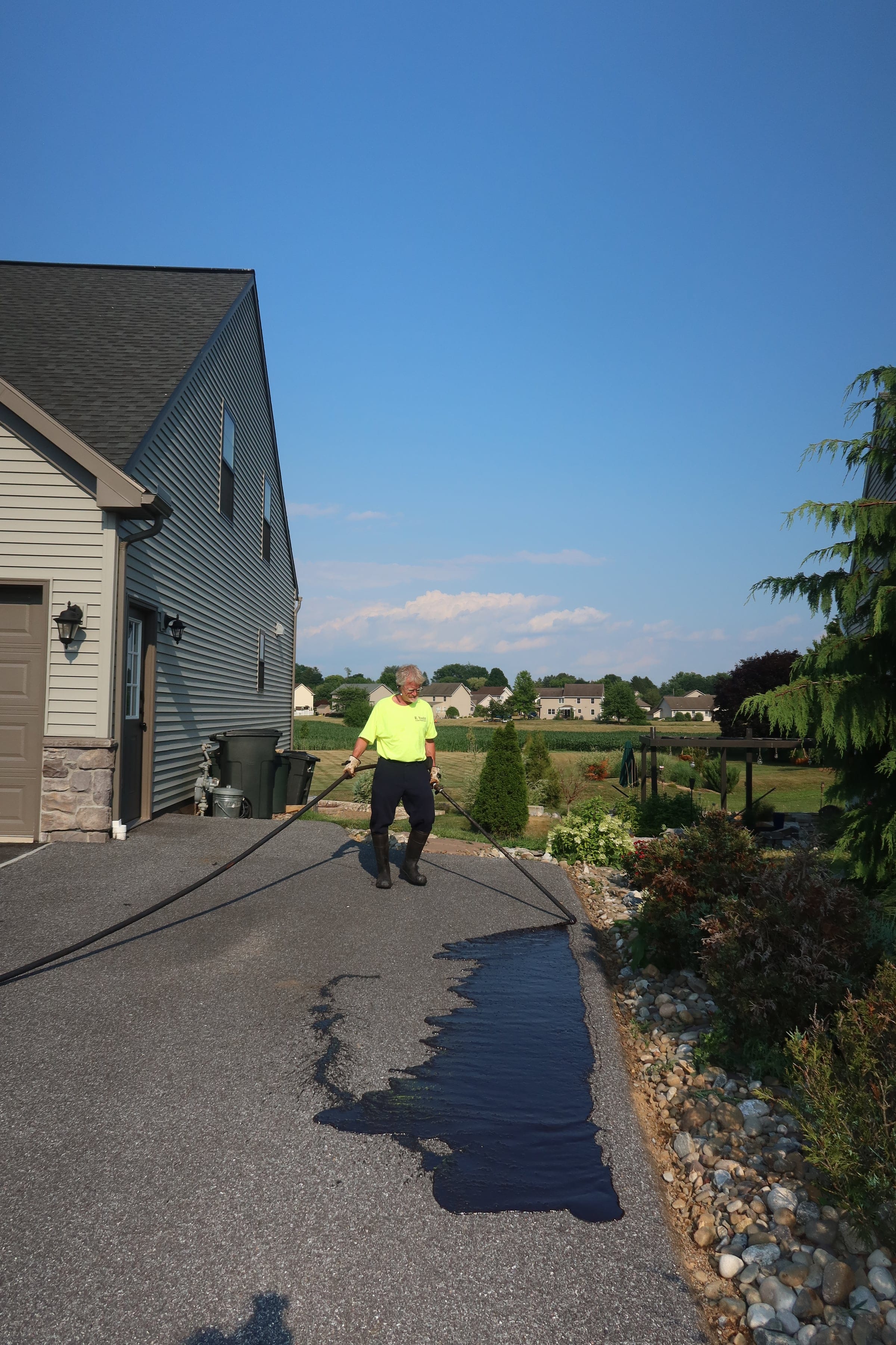 Spray-applied driveway sealcoating — R. Youtz Asphalt Maintenance
