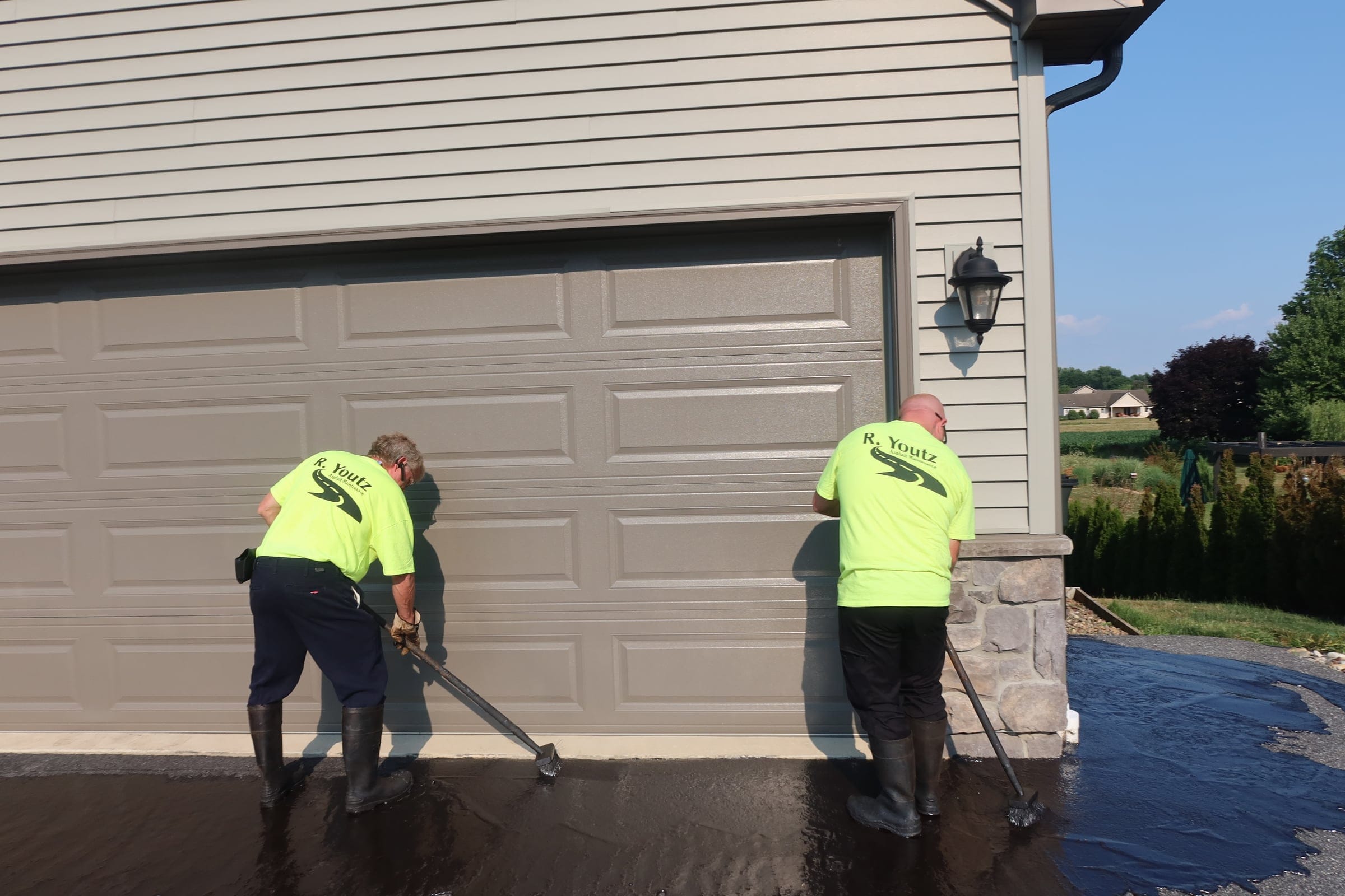 Two-person brush application — R. Youtz Asphalt Maintenance