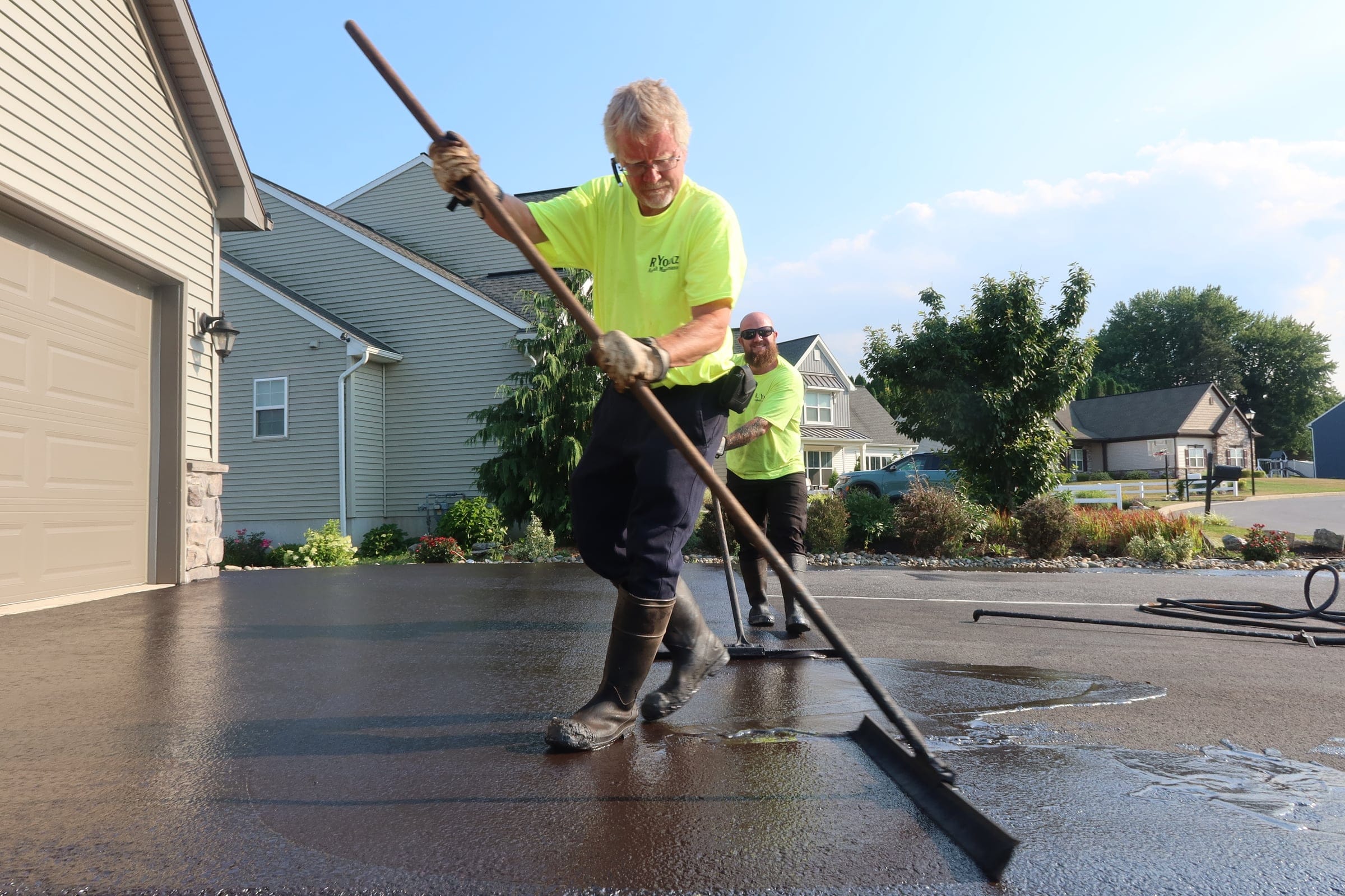 Two-worker brush crew — R. Youtz Asphalt Maintenance